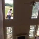 Workers make windows for home